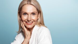 Mature woman with glowing skin after getting a medical-grade facial