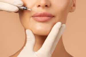 Woman's plump lips getting injections for lip flip in East Greenwich, RI